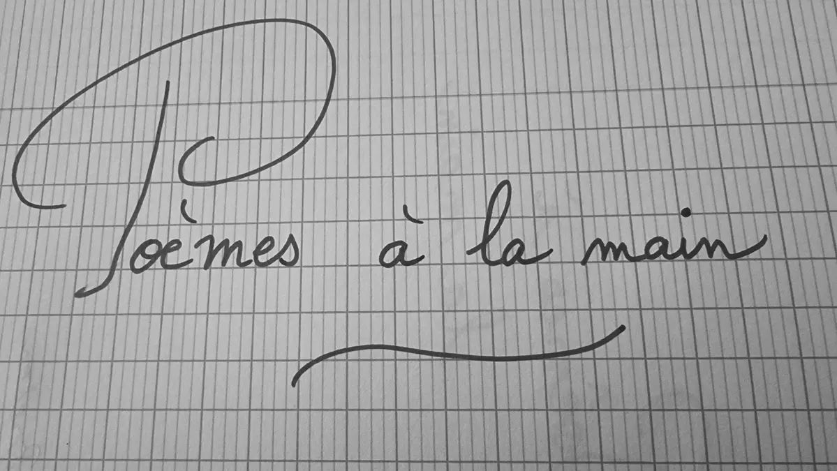poèmes à la main écrits sur mon cahier